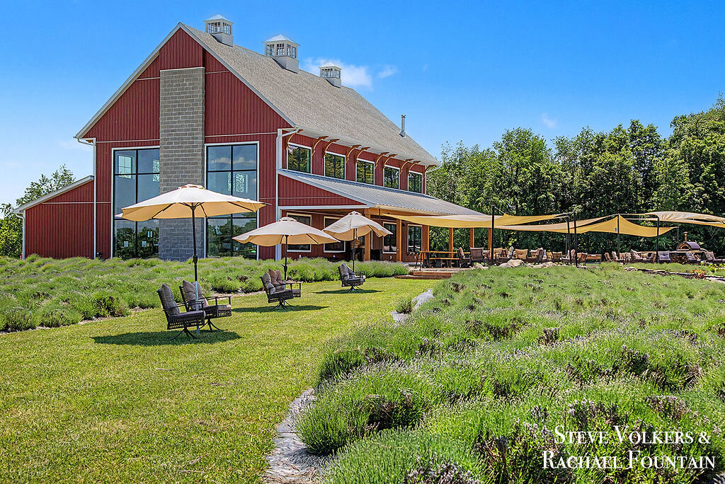 The custom barn across the lawn